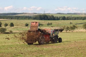 Muck spreader in a springwater catchment area